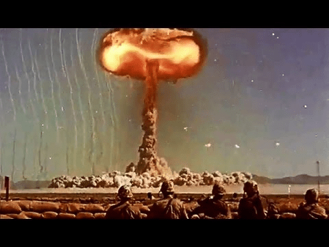 US Army Soldiers Observe Atomic Bomb Blasts in the 1950s. From public domain film from the US Army via the Prelinger Archive. 